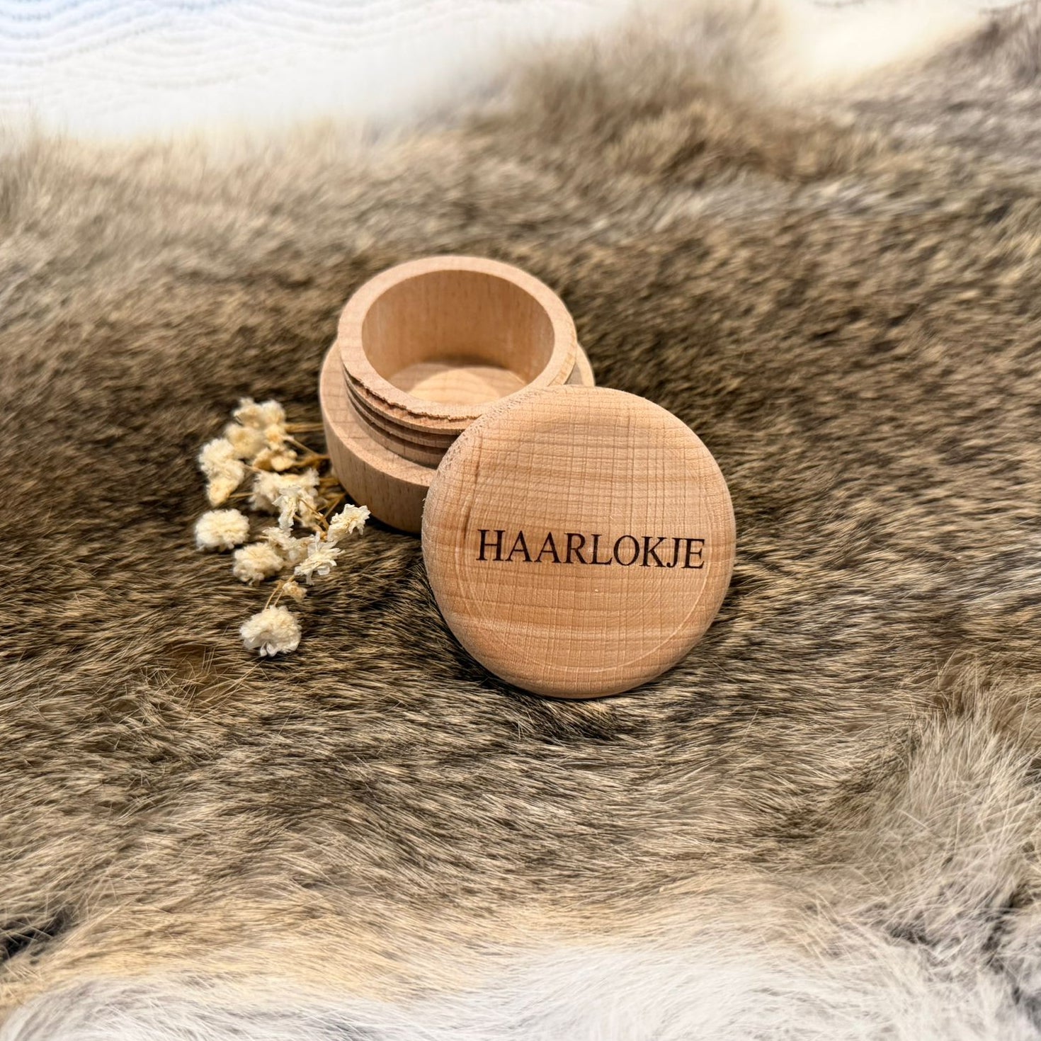 Houten bewaardoosje voor eerste haarlok